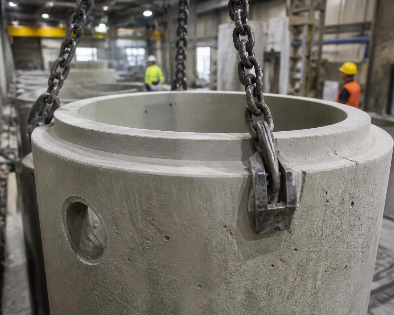 Precast concrete structure being finished inside the plant